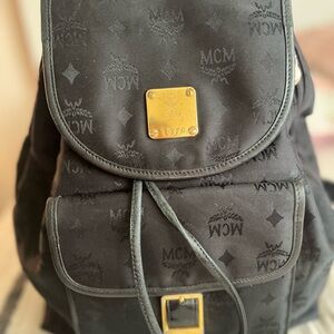 MCM Black Backpack with Gold Accents